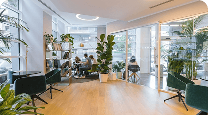 Modern office interior with plants and seating